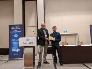 Boris Bernhardt receives the CAN NIA from Charles Bourque