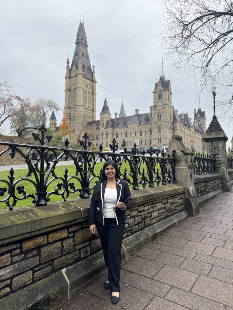 Sanjana Grover, neuroadvocate, in front of the Parliament